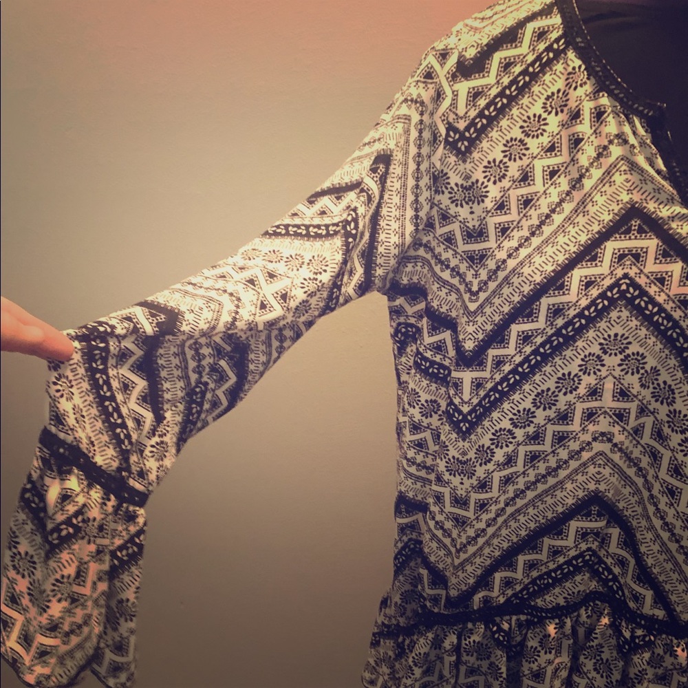 Black and white asymmetrical top.